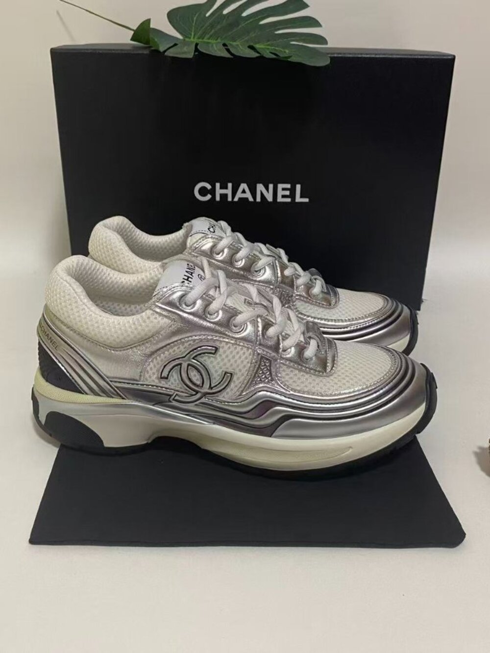 Chanel White & Silver CC Logo Sneakers